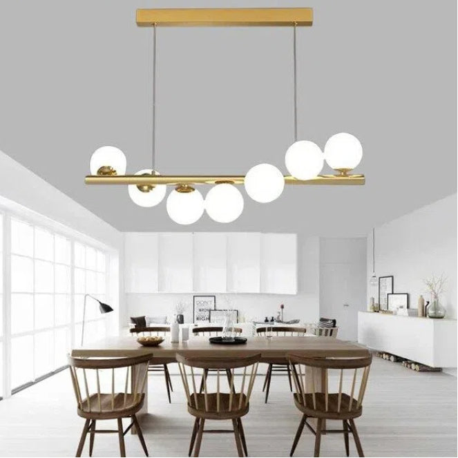 Lampadario a Sospensione Universo A06 – 7 Attacchi G9, Potenza 70W, Colore Oro, 7 Sfere Opache