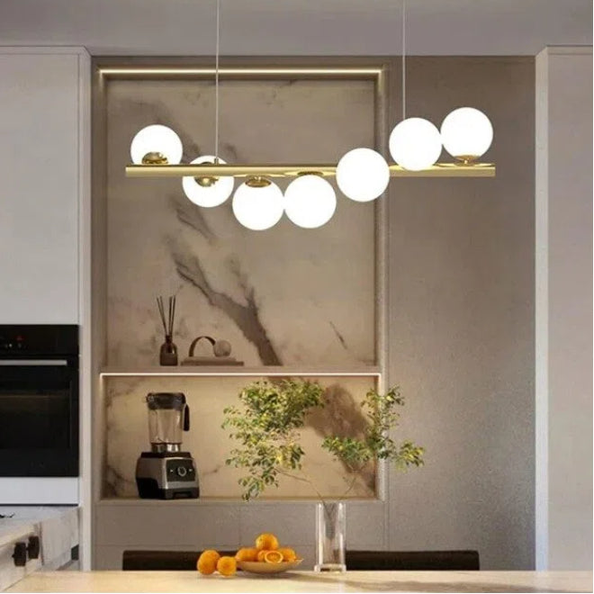 Lampadario a Sospensione Universo A06 – 7 Attacchi G9, Potenza 70W, Colore Oro, 7 Sfere Opache